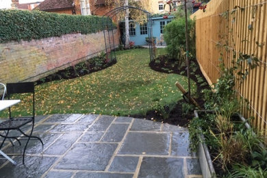 Photo of a medium sized contemporary back partial sun garden in Oxfordshire.