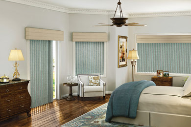 Example of a mid-sized classic master dark wood floor bedroom design in San Francisco with no fireplace and gray walls