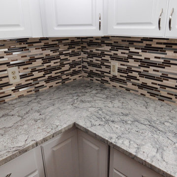 Thunder White Granite and tile backsplash