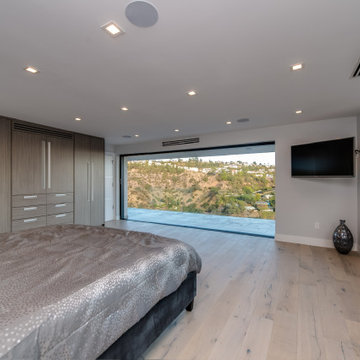 Bedroom with Integrated Storage Wall and Direct Terrace Access