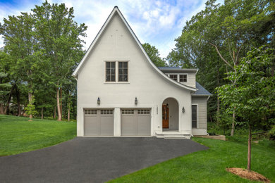 Inspiration for a french country white two-story house exterior remodel in DC Metro