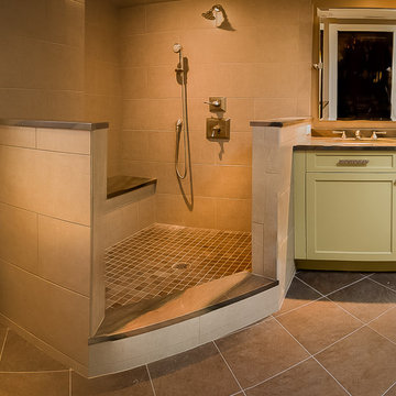Walk-in shower with seat and multiple shower heads