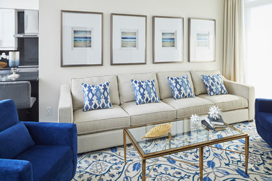 Example of a mid-sized transitional formal and open concept dark wood floor and blue floor living room design in Toronto with beige walls and no fireplace
