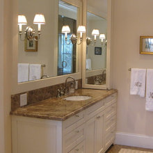 master bathroom - framed mirror with sconces