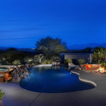 Landscape surrounding swimming pools in the desert southwest