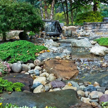 Falls and stream are a stunning addition to a rural yard