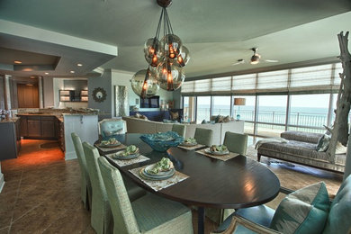 Design ideas for a beach style dining room in Miami.