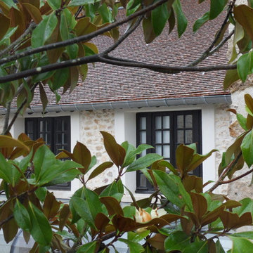 grande maison familiale à deux facettes