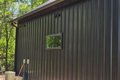 Inspiration for a rustic exterior home remodel in Dallas