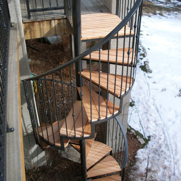 Wrought Iron Staircase with Hardwood Step Treads