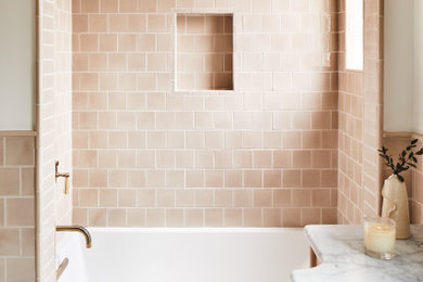 Inspiration for a pink tile tub/shower combo remodel in Nashville