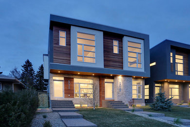 Example of a minimalist exterior home design in Calgary