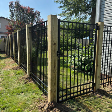 6' Ornamental Aluminum Black Fence installed on 6x6 treated pine posts