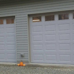Rowe Door Sales - Garage Doors And Openers