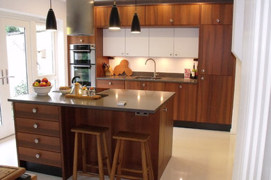 Example of a transitional kitchen design in Berkshire