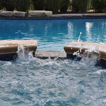 Mountain Lake style salt water in ground pool with Raised Spa