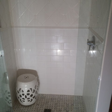 Ceramic Specialty Tile Shower with Herringbone Floor