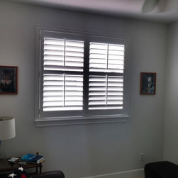 Crestview Shutters using large Deco frame and bi-fold track shutters - Interior Shutters
