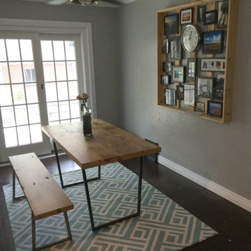 Reclaimed wood table in a Small dining room