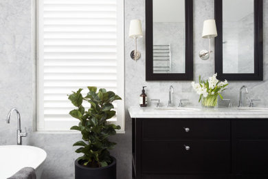 Mid-sized transitional kids bathroom in Melbourne with shaker cabinets, black cabinets, a freestanding tub, a double shower, a one-piece toilet, gray tile, marble, grey walls, ceramic floors, an undermount sink, marble benchtops, grey floor, an open shower and grey benchtops.