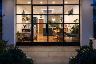 Medium sized contemporary rear house exterior in Cornwall.