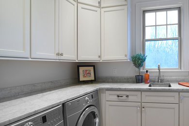 Inspiration for a transitional laundry room remodel in Other