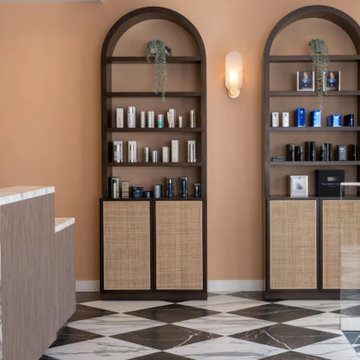 Warm-toned retail nook with rattan cabinetry