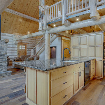 Double Sided Stone Fireplace with Copper Chimney