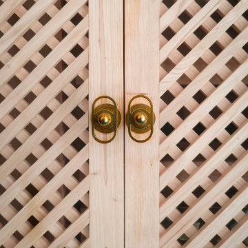 Porte de Dressing en bois et laiton.