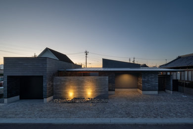 Modelo de fachada de casa gris moderna de tamaño medio