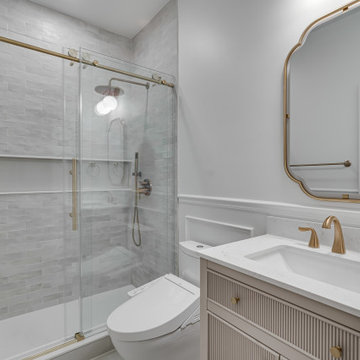 White Bathroom With Golden Finishes