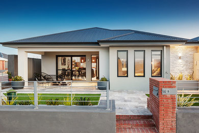 This is an example of a mid-sized contemporary one-storey grey exterior in Perth.