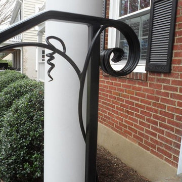 porch railing with vine decoration