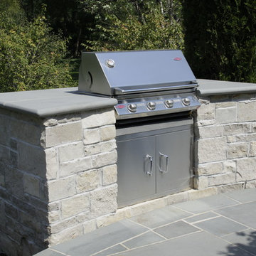Full Landscape with Patio, Outdoor Kitchen, Stone Driveway and Planting