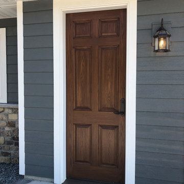 Front Door with Decorative Glass and Matching Service Door for Garage