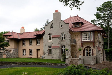 Huge farmhouse beige three-story stone exterior home photo in Philadelphia with a gambrel roof