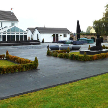Party Pad - Contemporary Black Limestone Patio & Outdoor Entertaining Space