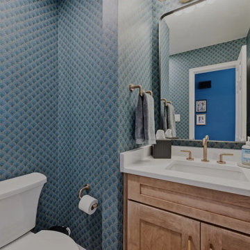 Warm Cherry Kitchen and Powder Room Remodel with Waterfall Island in Herndon, VA