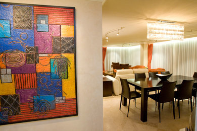 Trendy travertine floor living room photo in Miami