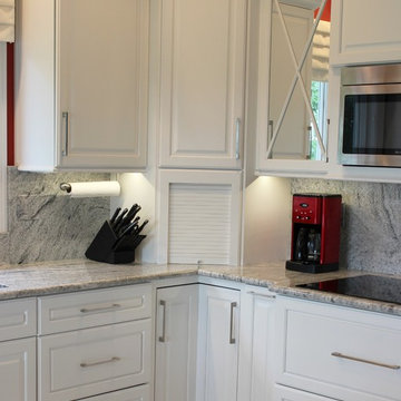 Geneseo, IL- Painted White Kitchen With Mirrored Cabinets and Full-Height Splash