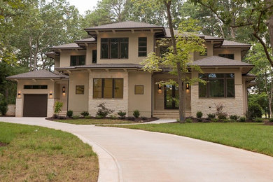 Example of a trendy two-story exterior home design in Raleigh