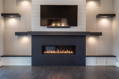 Arts and crafts family room photo in Charlotte
