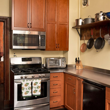Cherry Kitchen with Steel and Butcher Block Countertops