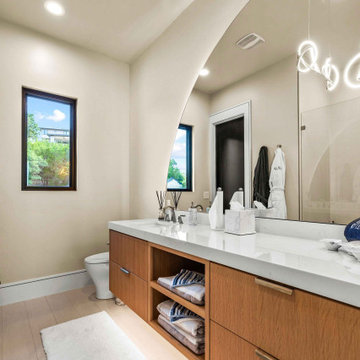 Guest Bathroom with Arched Detail and Floating Vanity