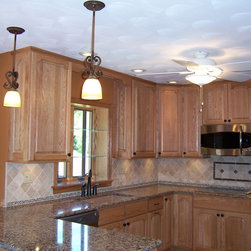 Bertch Legacy / Elite Door Style / Oak Wood / Natural Stain - Kitchen Cabinetry