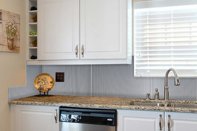 Kitchen - industrial kitchen idea in Other