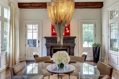 Example of a tuscan dining room design in Dallas