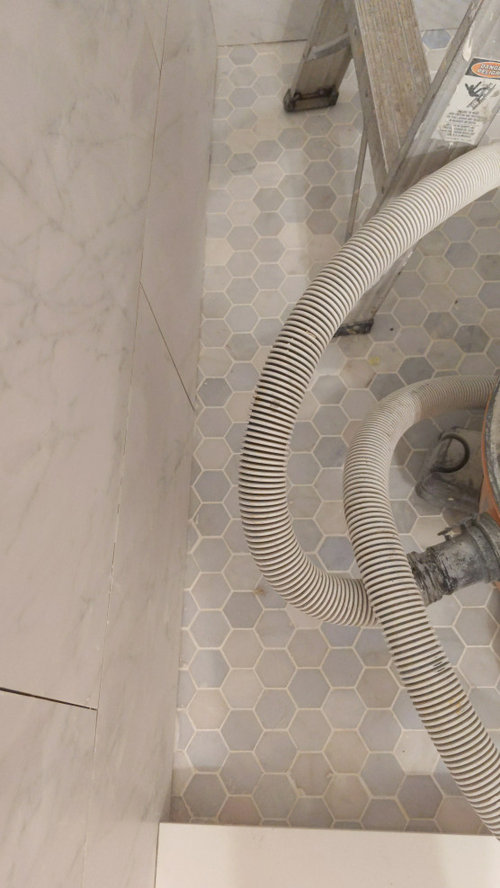 Hexagon Tile Shower Floor Crooked?