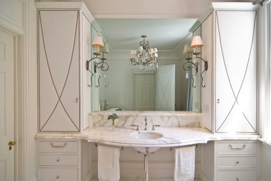 Bathroom - mid-sized traditional master white tile and mosaic tile mosaic tile floor bathroom idea in Orange County with beaded inset cabinets, white cabinets, white walls, an undermount sink and marble countertops