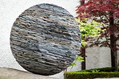 Stone Sphere Garden Sculpture - 'Everwatchful'